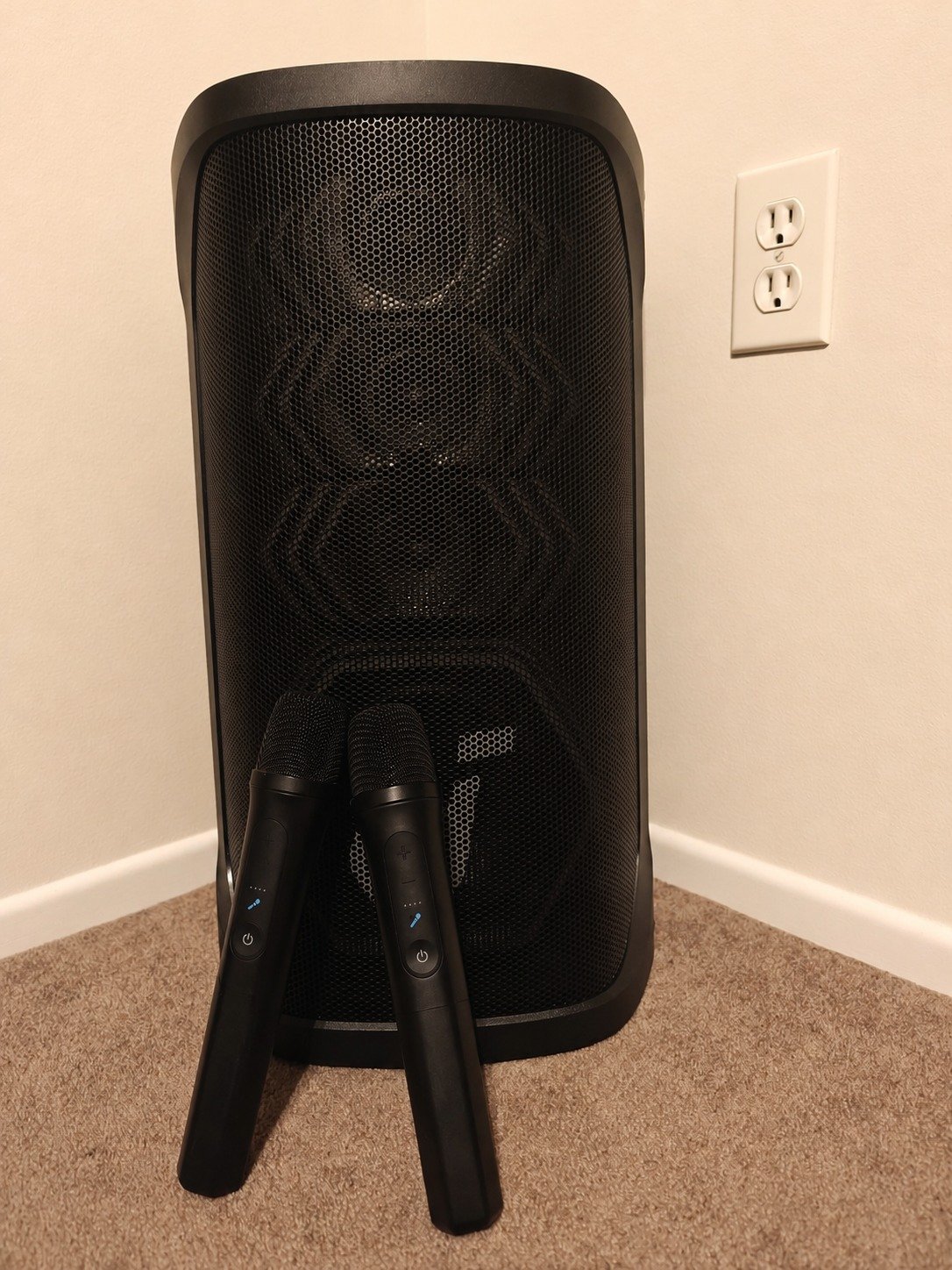 Soundcore Rave 3S party speaker with two wireless microphones in the author’s home