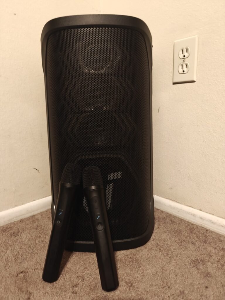 Soundcore Rave 3S party speaker with two wireless microphones in the author’s home